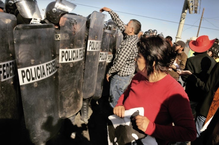 Sociedad civil en evento de la OCDE en México rechaza la represión en Oaxaca