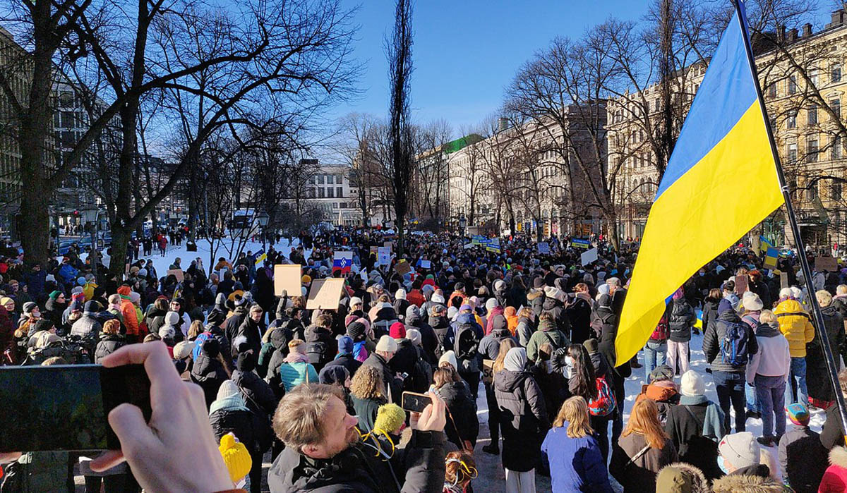 A protest crowd demonstrating against the war in Ukraine