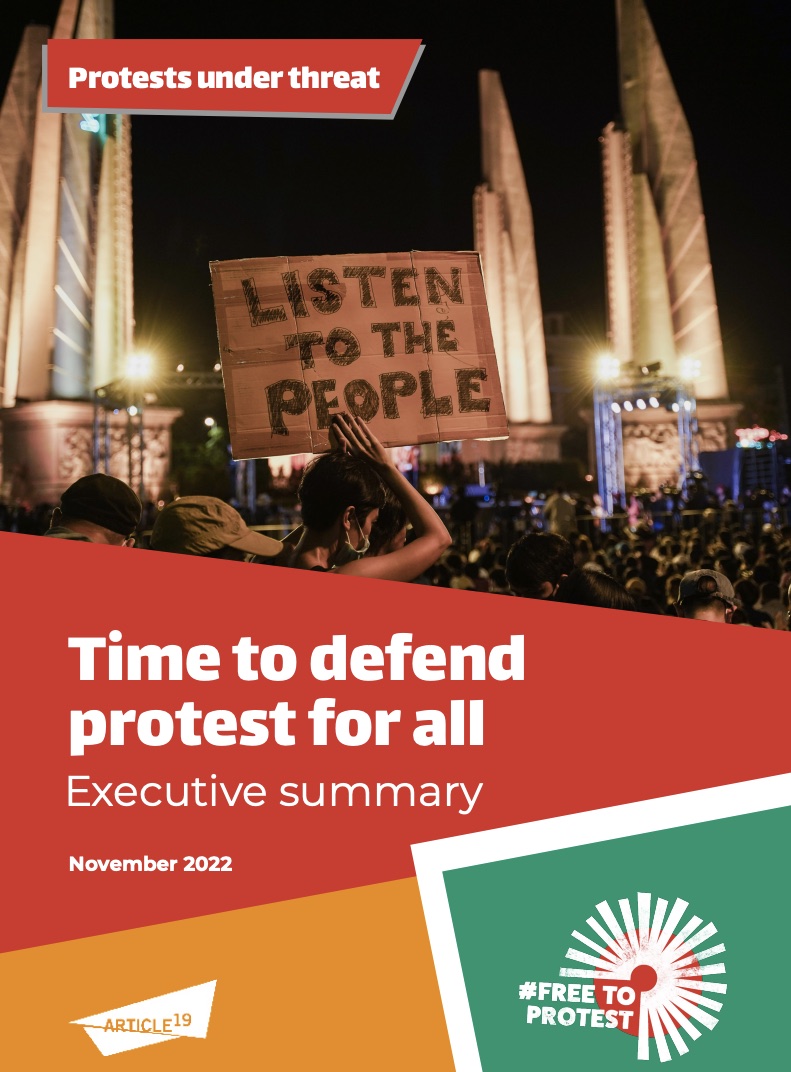 Cover image for a Free to Protest report showing protesters at night with one holding a sign that says 'lister to the people'.